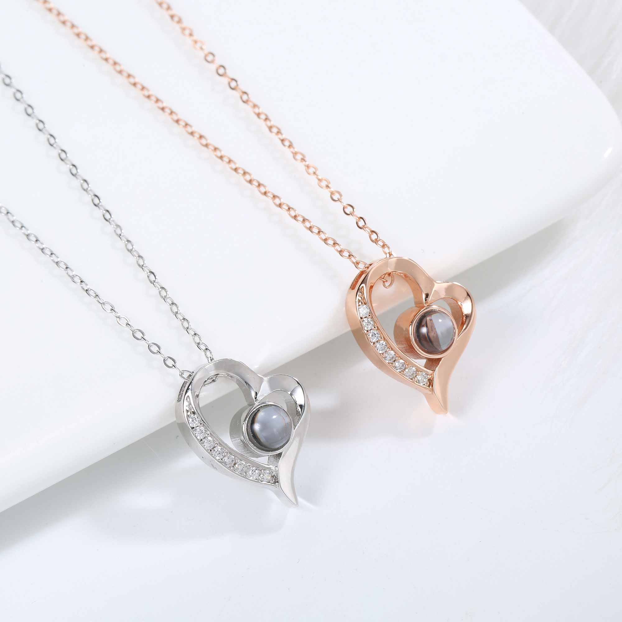 QRystal Gentle Heart heart pendant necklace in silver and rose gold with integrated QR technology